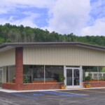 A large parking area is available for trailers. Two entrances provide pull-through access. A large parking area is available for trailers. Two entrances provide pull-through access.