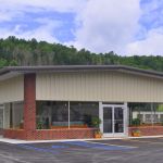 A large parking area is available for trailers. Two entrances provide pull-through access. A large parking area is available for trailers. Two entrances provide pull-through access.